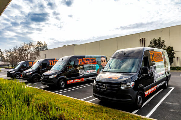 Vehicles at parking | Flooring Liquidators Franchise